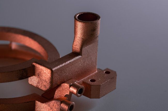 Improving reflective metal processing with short-wavelength laser systems