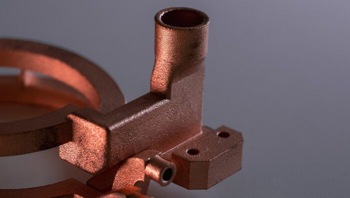 Improving reflective metal processing with short-wavelength laser systems